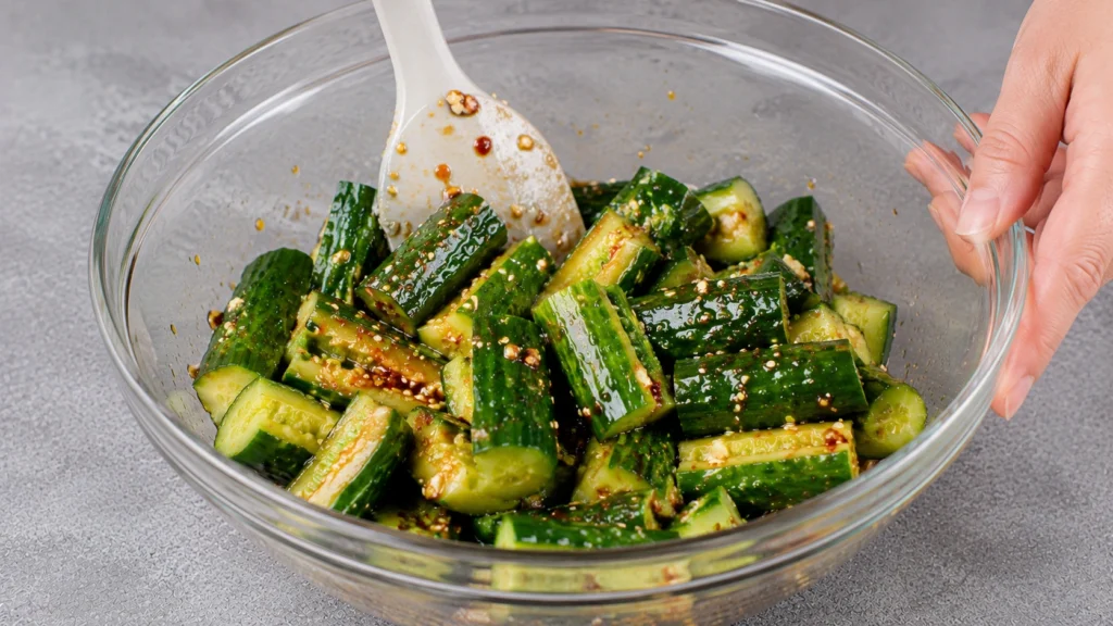 Tossing Cucumbers with Dressing