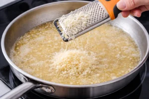 adding parmesan cheese to alfredo sauce without cream